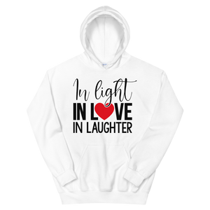 Sudadera con capucha unisex "EN LA LUZ, EN EL AMOR, EN LA RISA"